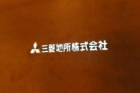 Mitsubishi Estate signboard and logo